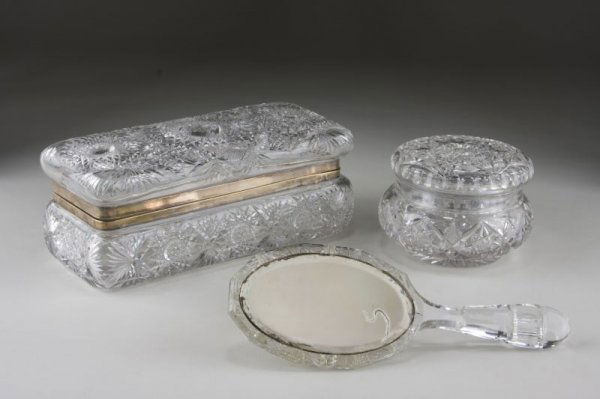 Cut Glass Vanity Box, Powder Jar and Hand Mirror: Cut Glass Vanity Box, Powder Jar and Hand Mirror the box blown and cut with hobstar pattern, having a hinged lid and mounted with sterling silver (stamped Sterling and CFM Co.). The powder jar is fine