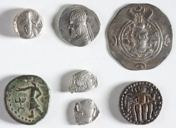 Seven Ancient Eastern Greek Coins: Seven Ancient Eastern Greek Coins as follows: Persian Empire, Lydia, AR siglos, 5th-4th century B.C., small countermark on right field; Parthian Empire, Orodes I, 90-77 B.C., AR drachm; Sassanian Empi