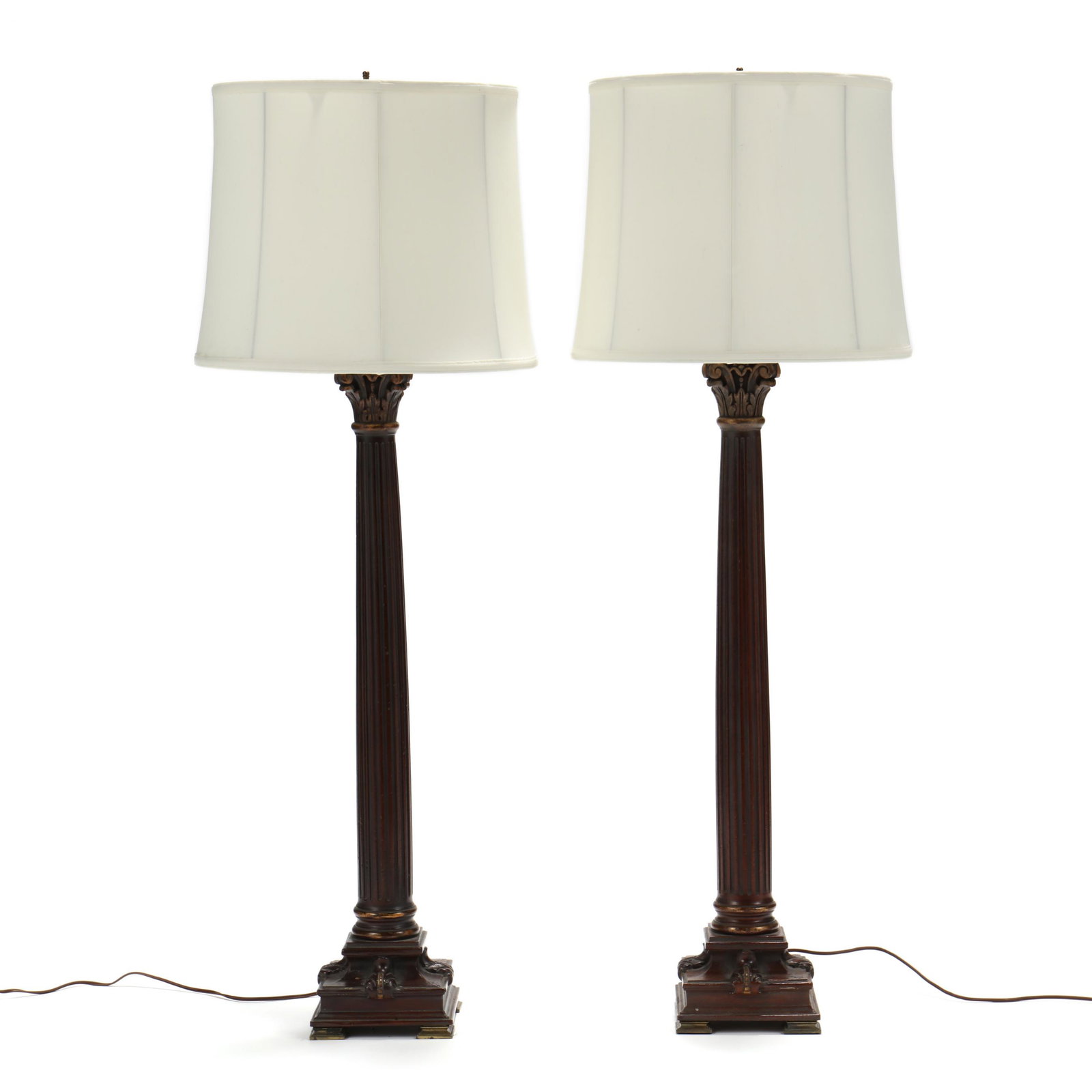 Frederick Cooper, Pair Tall Column Lamps: Frederick Cooper, Pair Tall Column Lamps20th century, wood and composition, double socket fixtures, mounted atop a corinthian style column with gilt details, on a stepped square plinth with four brack