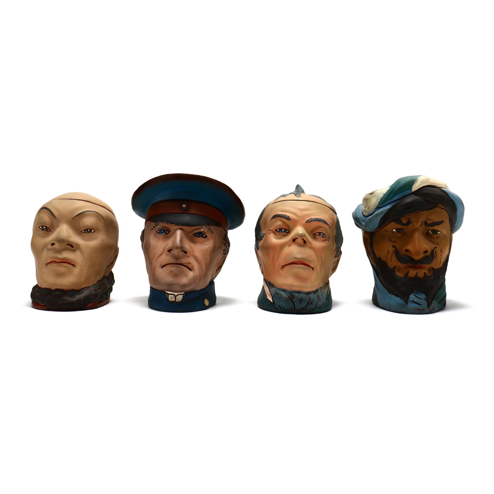 Four Pottery Character Humidors, Weller Dickens Ware II: Four Pottery Character Humidors, Weller Dickens Ware II circa 1905, matte glazed earthenware, The Irishman, The Turk, The Chinaman, the Captain, marked inside covers ''DICKENS WELLER" although the Chi