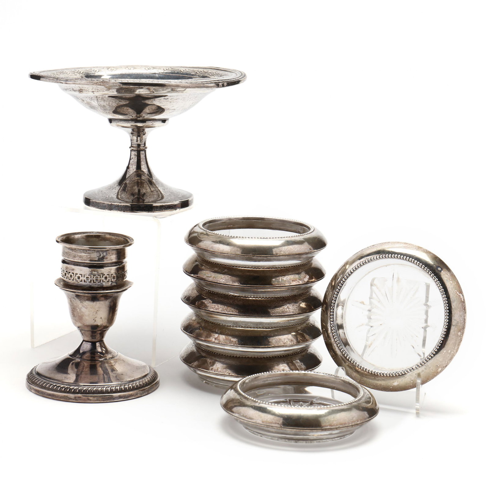 A Grouping of Nine Sterling Silver Table Accessories: A Grouping of Nine Sterling Silver Table Accessoriesthe first a round compote by Watson Company, model number 9845 /6, 4 1/4 oz. capacity, with weighted pedestal base (3 34/ x 6 in.); the second a can