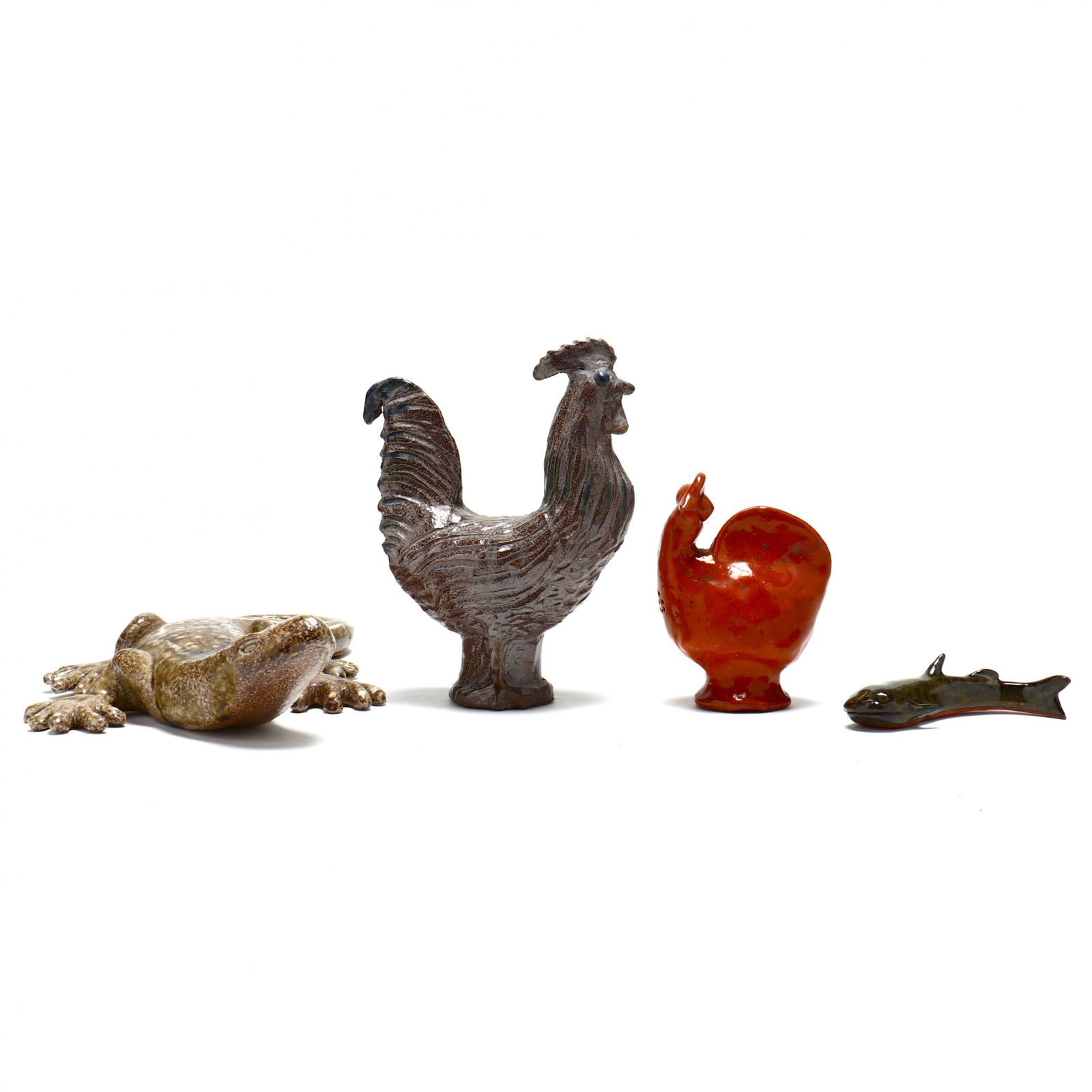 NC Pottery including Charles Moore, Animal Grouping: NC Pottery including Charles Moore, Animal Groupingto include: an early Jugtown molded earthenware chicken shaker (5 in.) ( small chip to beak; other imperfections such as glaze chips); a salt glazed