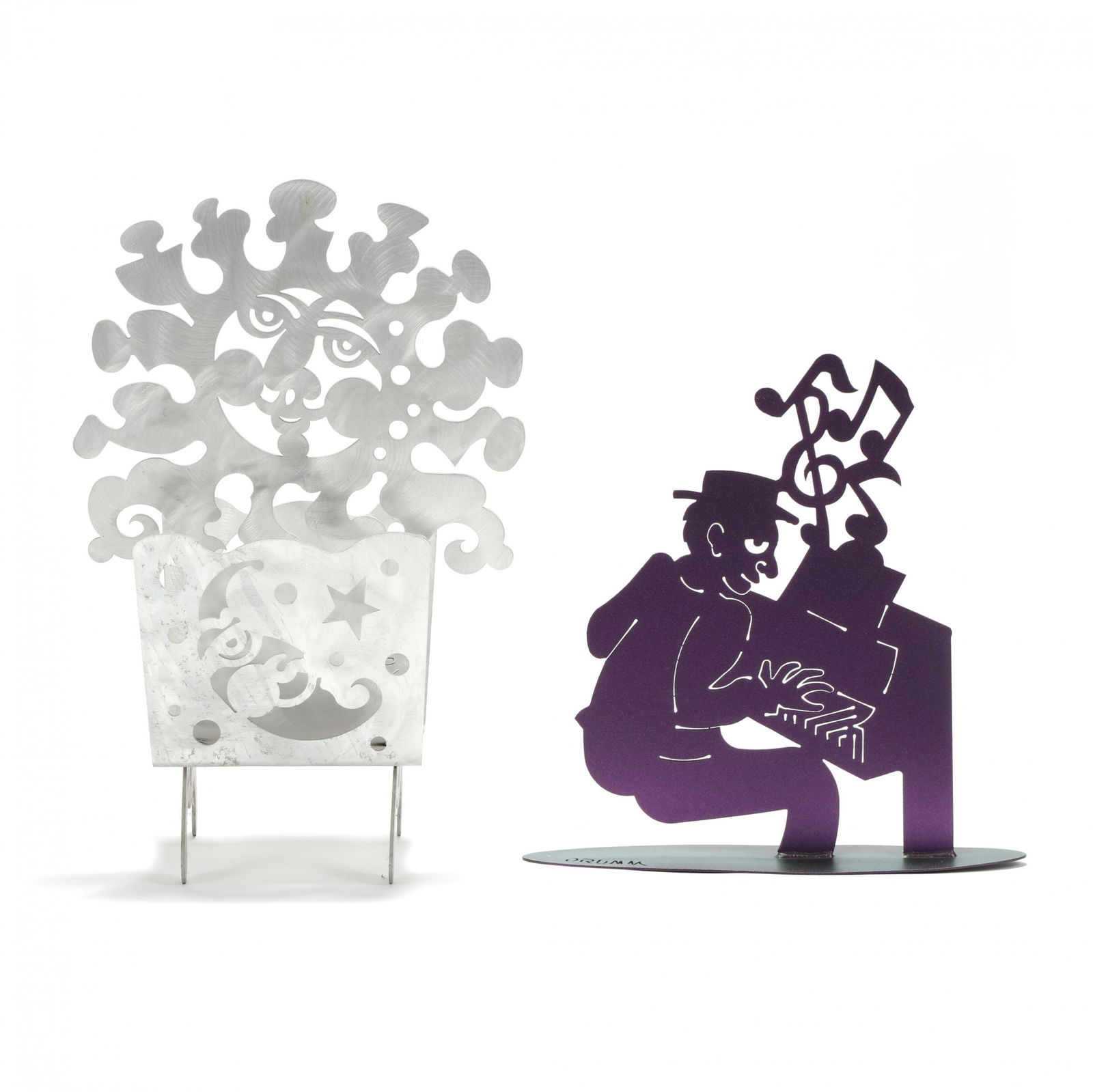 Don Drumm (OH/NC, b. 1935), Metal Bookstand and: Don Drumm (OH/NC, b. 1935), Metal Bookstand and SculptureCricket Forge, contemporary, including a brushed aluminum sun-and-moon cut-out bookstand (22 x 13 x 10 in.); and a cut-out steel and green/purp