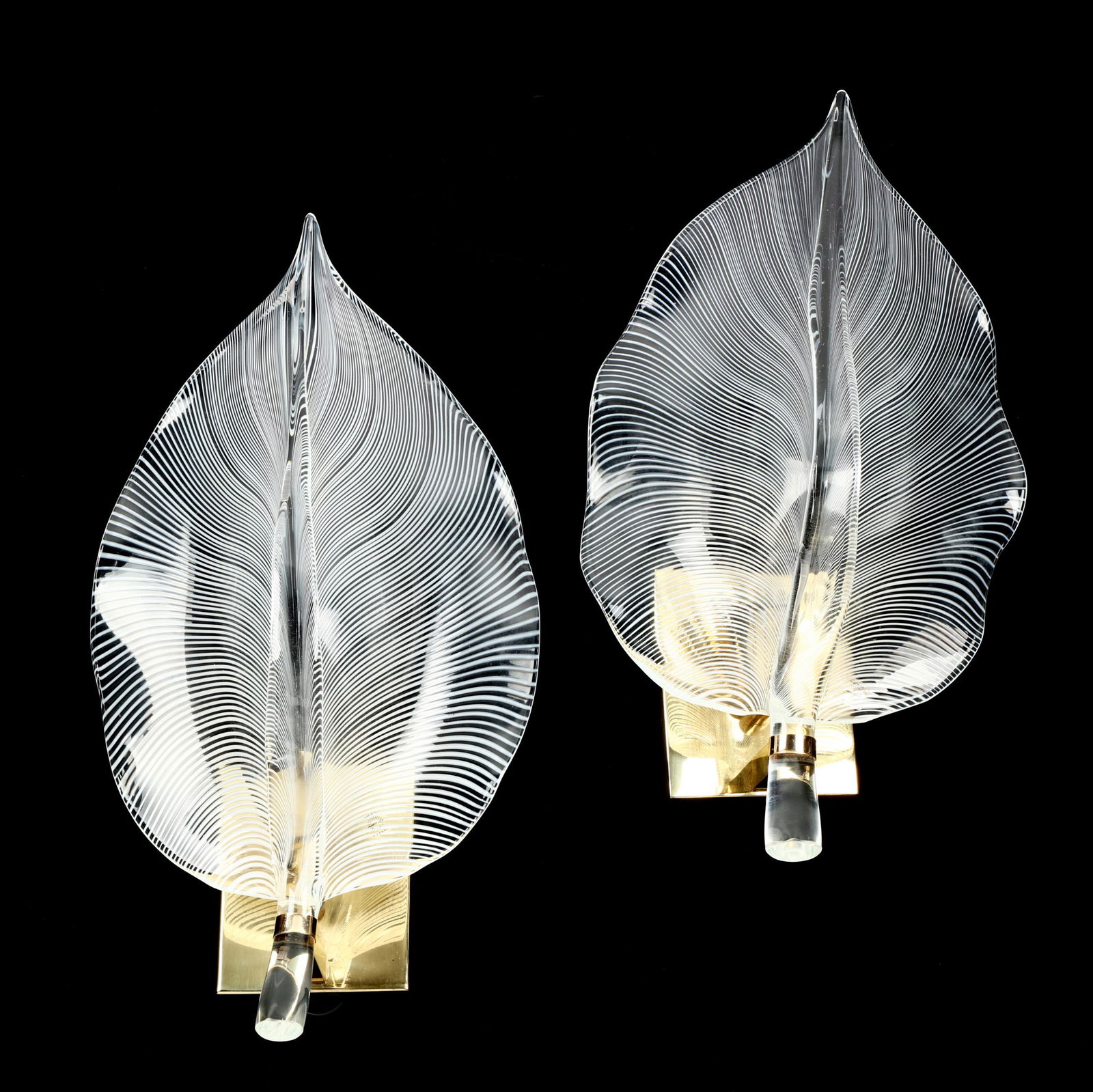 Franco Luce, Pair of Glass Leaf Wall Sconces: Franco Luce, Pair of Glass Leaf Wall Sconces1970s, Murano, clear glass leaves with white stripes, ruffled naturalistic edge, brass wall mount, labeled. 19 x 10 x 5 in. Private Collection, Chapel Hill,