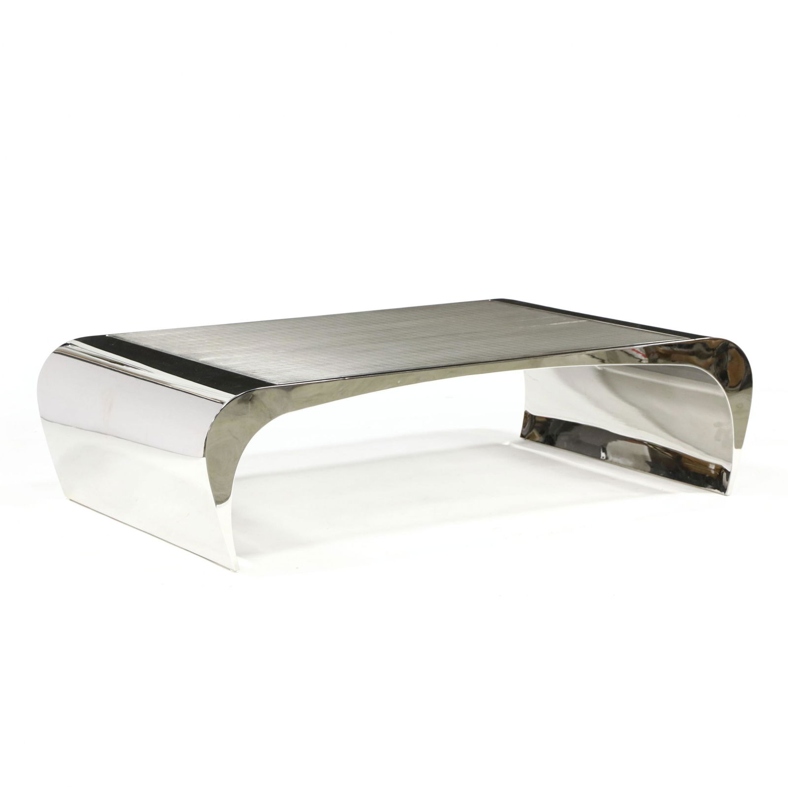 Louis A. Lara, Selina K Steel Coffee Table: Louis A. Lara, Selina K Steel Coffee Tablefor Brueton, late 20th century, hollow polished steel with inset steel grate, curved tapered legs, unmarked. 16 x 60 x 36 in. Private Collection, Wilmington,