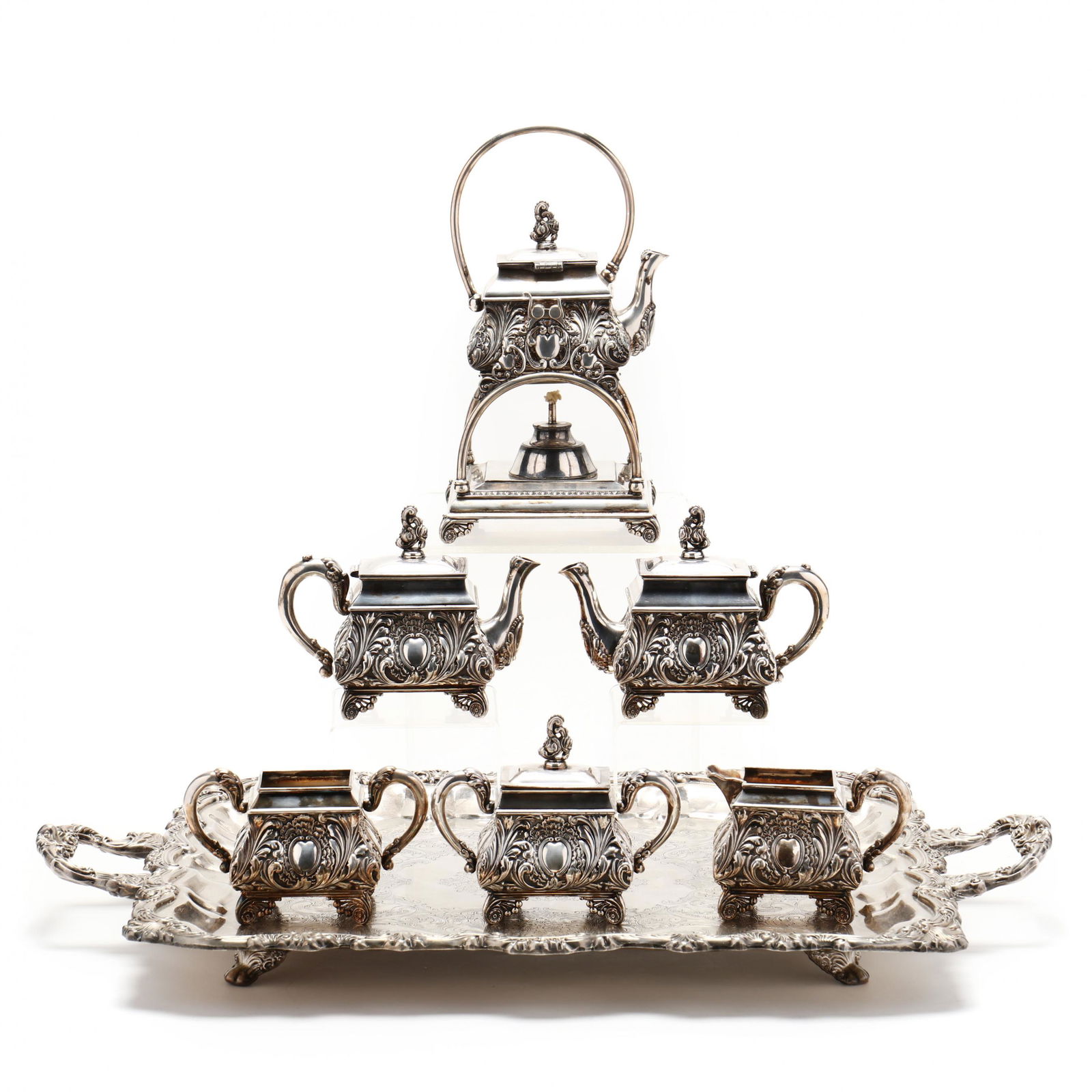 Antique Boston Silverplate Tea Service, James W. Tufts: Antique Boston Silverplate Tea Service, James W. TuftsAll model number 1806, quadruple plate, to include: spirit kettle on stand (11 1/4 in. including handle); (2) teapots (5 in.); creamer (3 5/8 in.)