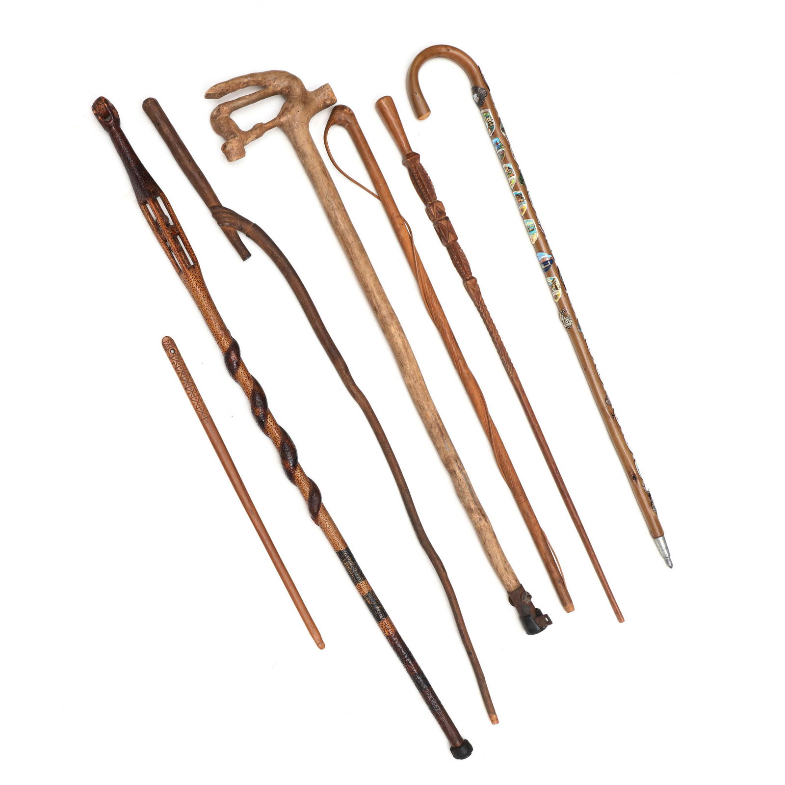 Six Vintage Canes and a Carved Wooden Implement (1 of 10)