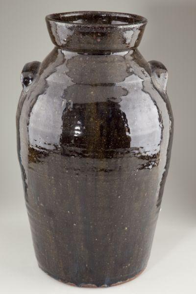 Burlon Craig Five Gallon Storage Jar: Burlon Craig Five Gallon Storage Jar NC pottery, stoneware with dark ash glaze, some rutile, stamped "5" for capacity, having a high collar with interior rim and applied ear handles, stamped on the bo