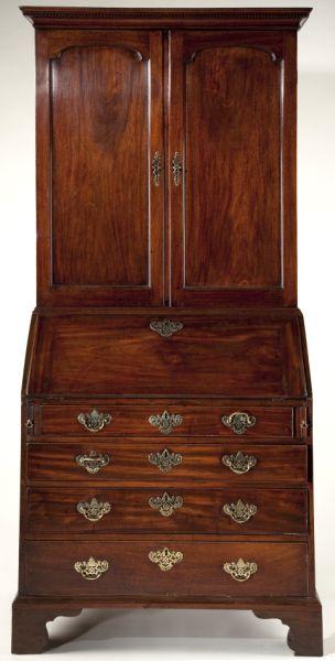 English Chippendale Antique Secretary Bookcase: English Chippendale Antique Secretary Bookcase mahogany, two-part form, the top section having a molded cornice over dentil molding, the two hinged doors open to an adjustable shelved interior. The de