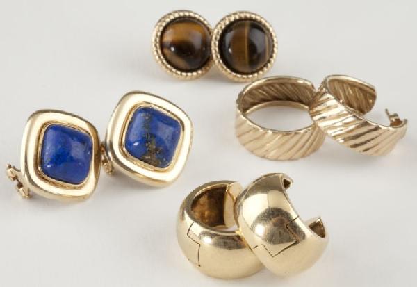 Four Pairs of Gold Earrings: Four Pairs of Gold Earrings including one pair of bold and well made gold hoop earrings, the second pair with a sugar loaf cabochon shaped lapis with gold surround, the third with round tigers eye cab