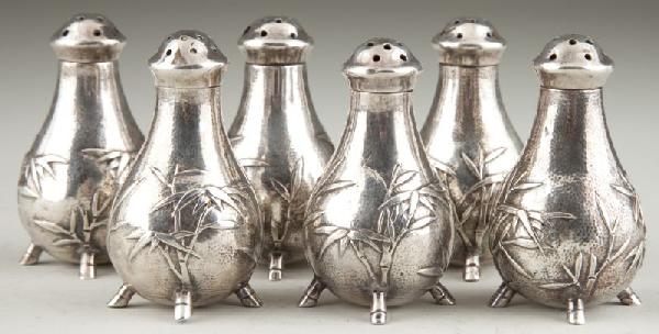 Chinese Export Silver Pepper Pots by Tuck Wang: Chinese Export Silver Pepper Pots by Tuck Wang each with hand-chased motif of bamboo against a stippled ground, each raised on four bamboo form feet, each with removable pierced and domed covers, five