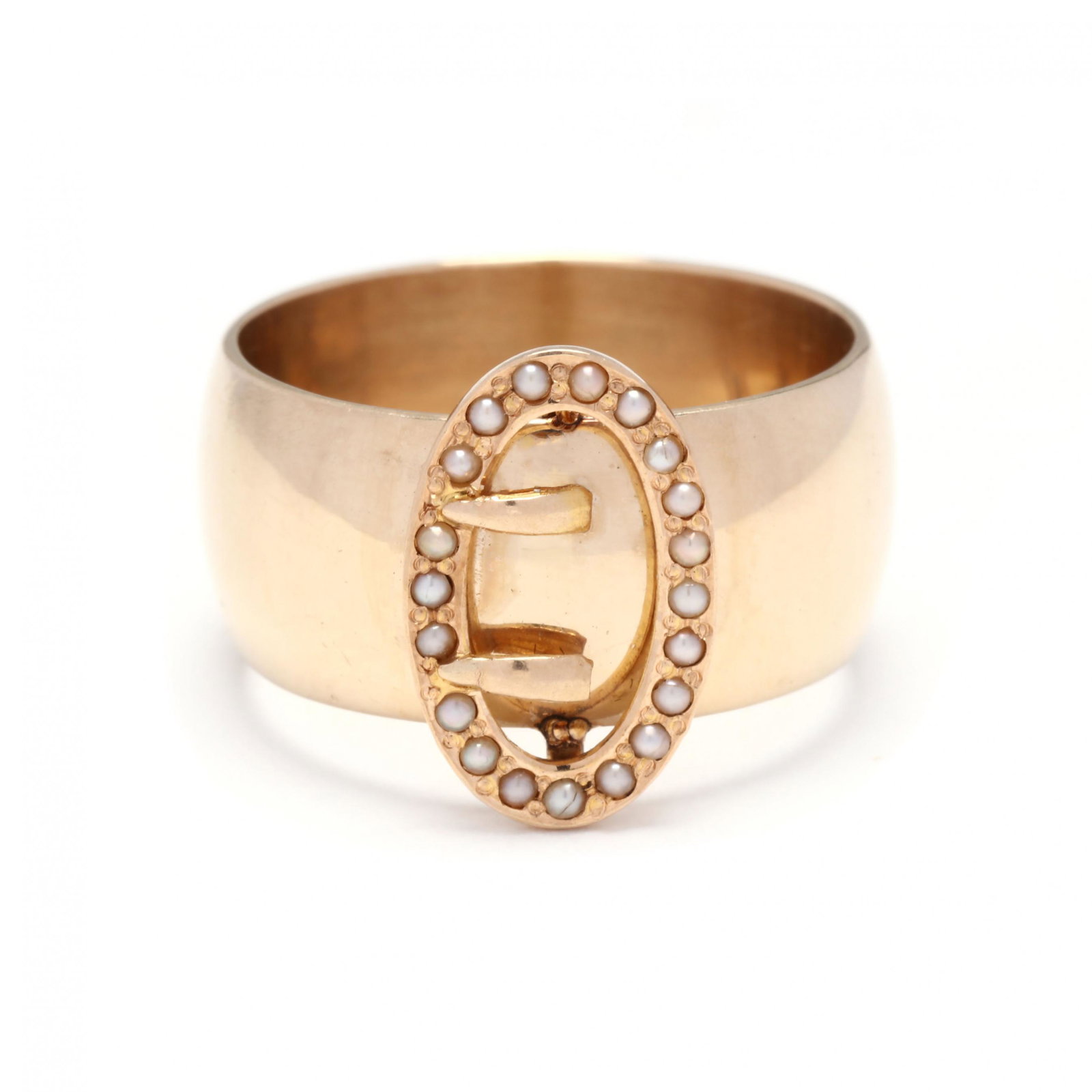 Gold and Seed Pearl Buckle Motif Ring: Gold and Seed Pearl Buckle Motif Ring the wide band with central oval buckle set with seed pearls, testing 14KT. 14.2mm; Ring size 6.5 5.8 dwt. From the Elaine Miller Collection, Raleigh, North Caroli
