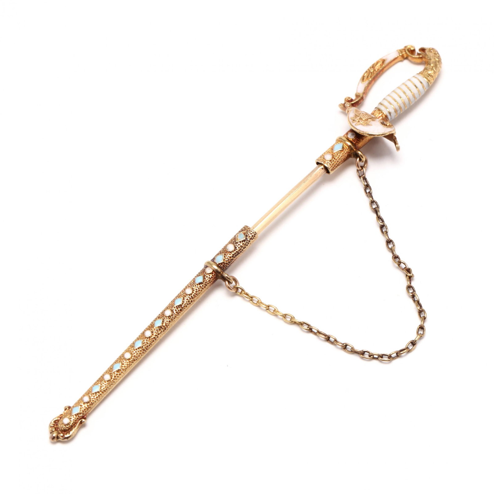 Gold and Enamel Jabot Pin: Gold and Enamel Jabot Pin sword motif jabot pin with enamel decorated hilt, gold sheath with chain, testing 14KT. 3 in. 2.3 dwt. Private Collection of Joan Veasey, North Carolina Additional high-resol