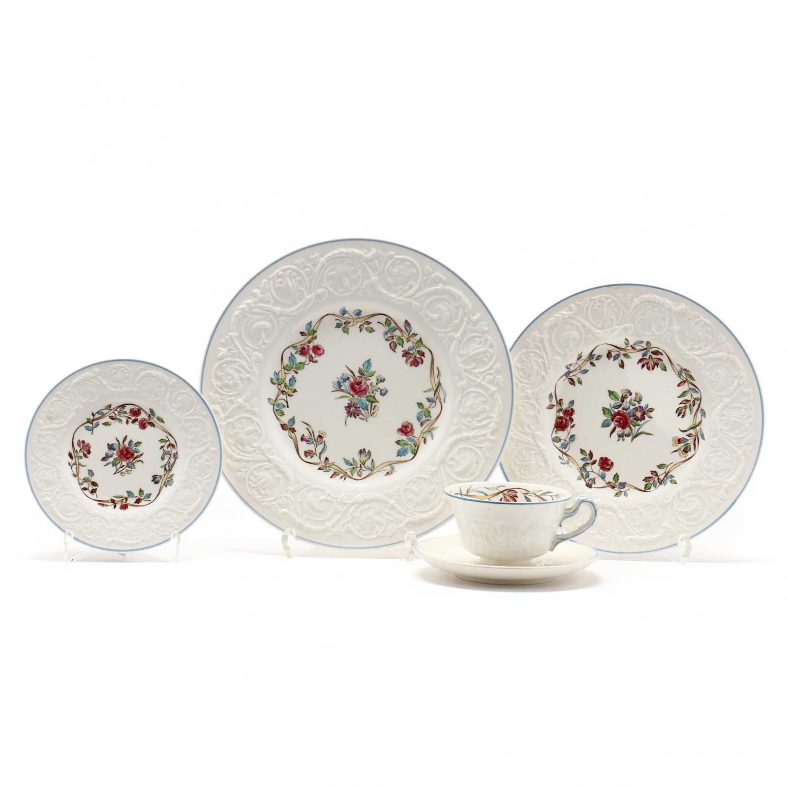 Wedgwood, (70) Pieces of Argyle Dinnerware: Wedgwood, (70) Pieces of Argyle Dinnerware (70) pieces, embossed flower and vine border surrounds a polychrome wreath which rings a bouquet, to include: (8) dinner plates (10 5/8 in.); (7) luncheon pl