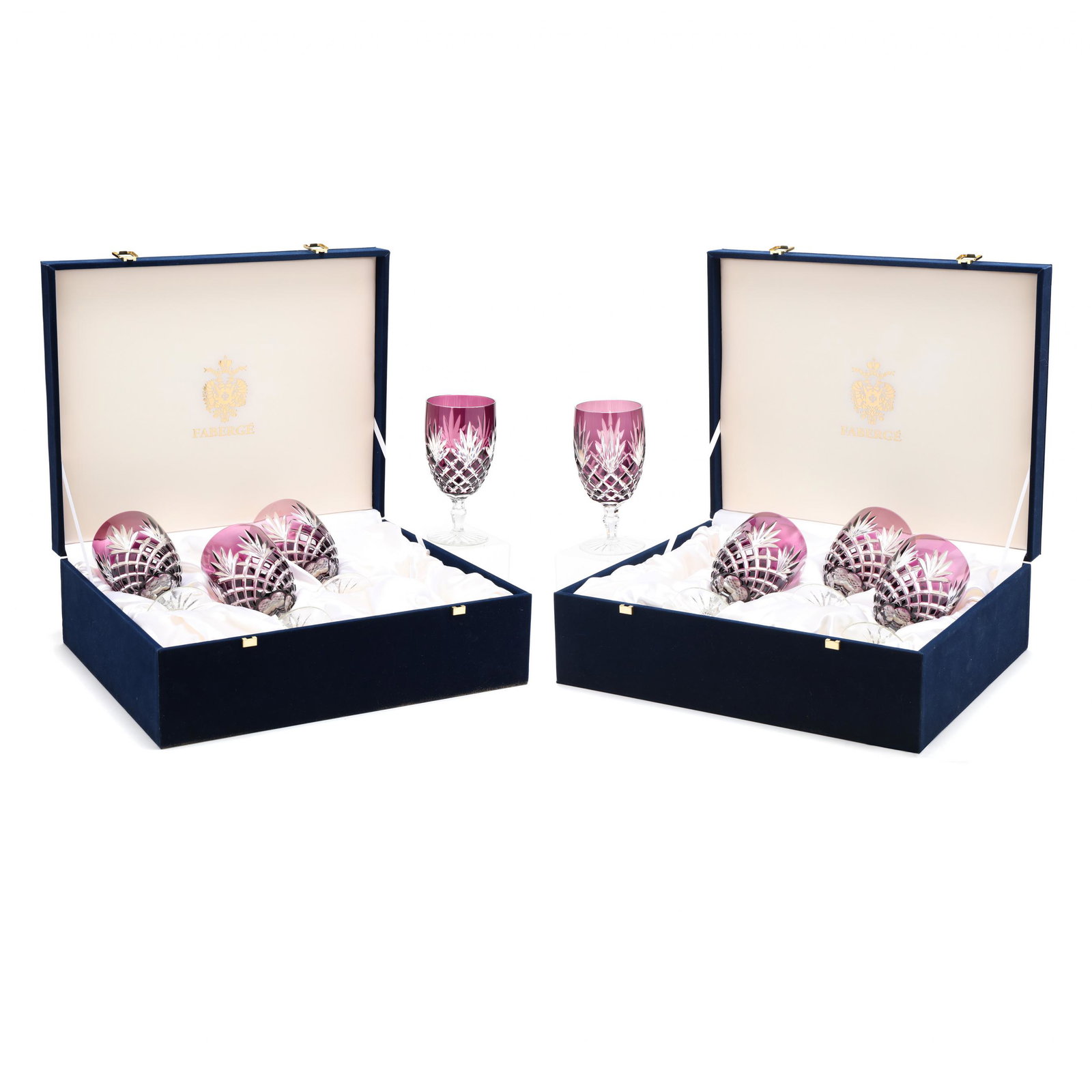 FabergÃ©, Set of Eight Harlequin Cut to Clear Goblets: FabergÃ©, Set of Eight Harlequin Cut to Clear Goblets Russia, late 20th century, amethyst cut to clear fan and diamond pattern, faceted stem on a star cut foot, marked, with blue velvet presentation