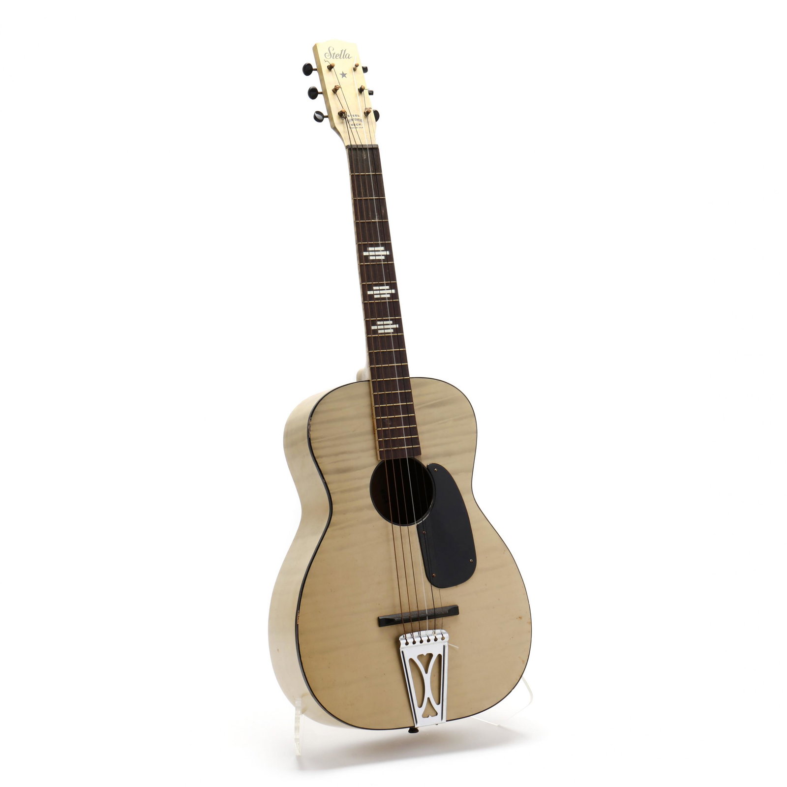 Vintage 1960s Stella Flat Top S-61-HB Guitar With: Vintage 1960s Stella Flat Top S-61-HB Guitar With "Steel Reinforced Neck" serial number 1943H928, wood stained with a subtle lime-tinted finish featuring faux maple wood grain throughout, trapeze tail