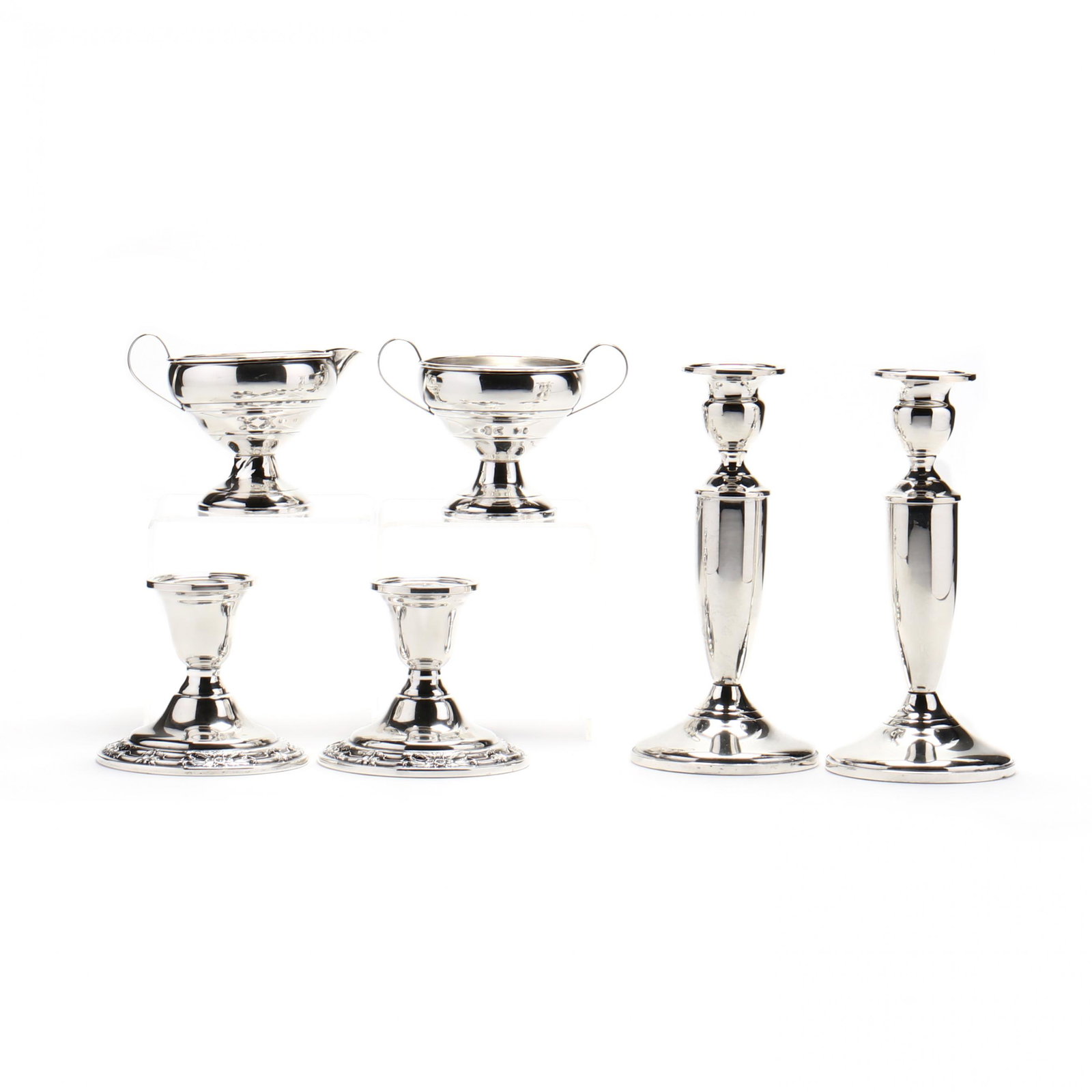 Three Pairs of American Sterling Silver Table: Three Pairs of American Sterling Silver Table Accessoriesto include: pair of International Silver Co. Wild Rose low candlesticks, pattern number N243 (3 1/4 in.); pair of candlesticks by Towle, patter