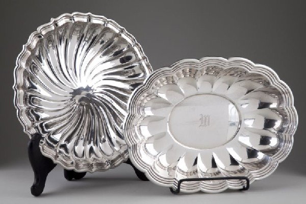 Two Gorham Sterling Silver Trays: Two Gorham Sterling Silver Trays an oval form with triple molded shaped rim and concave lobed sides #977 monogrammed "W" 2 x 13 3/8 in. and a circular one having a shaped molded rim and swirl design t
