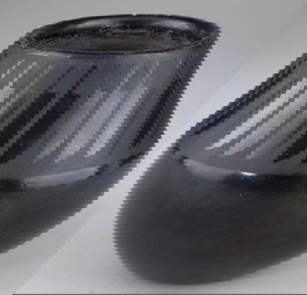 San Ildefonso Pueblo Maria-Popovi Blackware Pot: San Ildefonso Pueblo Maria-Popovi Blackware Pot signed on the base, with a repeating feather motif running from the mouth to the shoulder. This piece was created by the celebrated Maria Martinez in pa