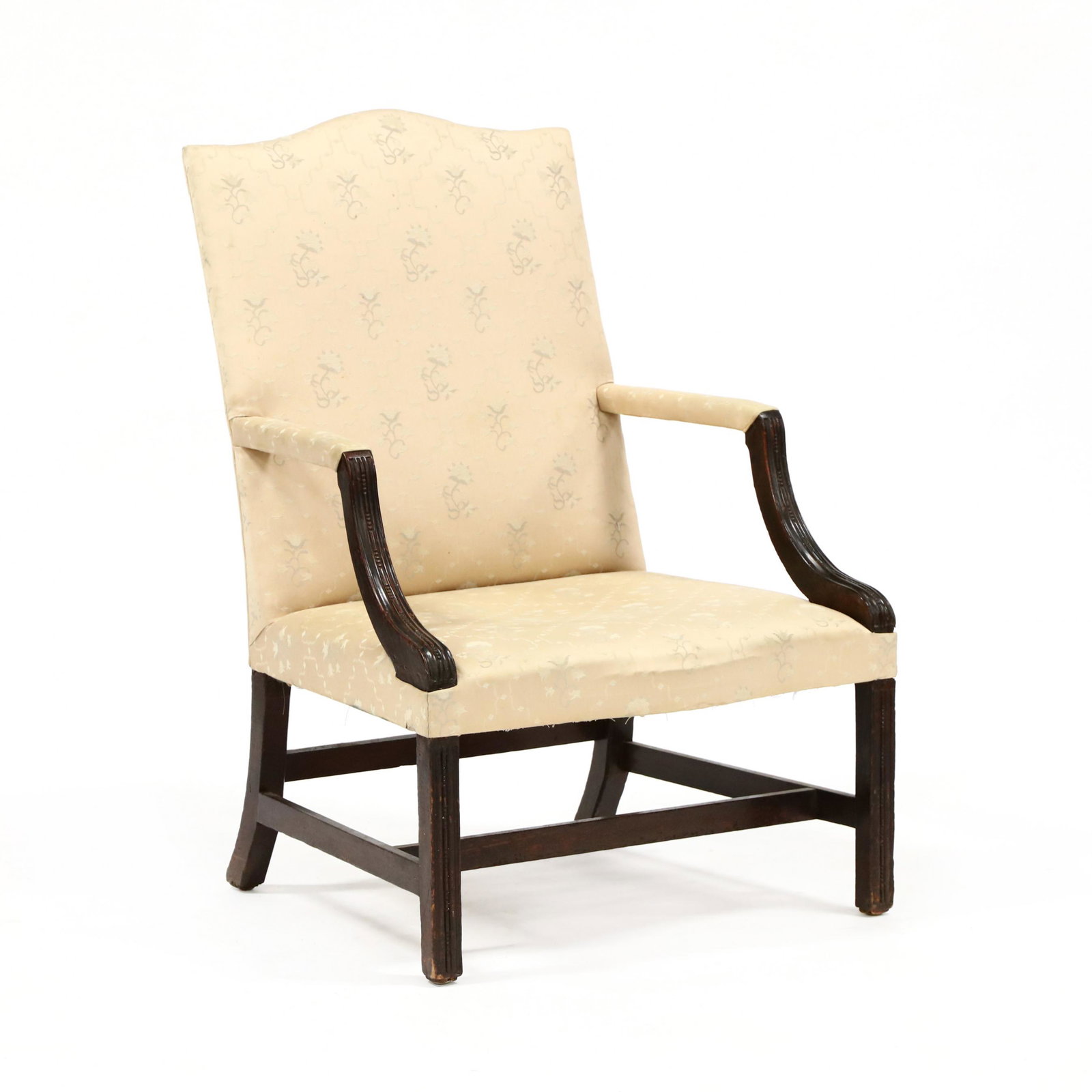 George III Carved Mahogany Lolling Chair: George III Carved Mahogany Lolling Chair late 18th century, oak secondary, shaped crest rail, straight arms, curved and molded supports, serpentine seat, molded straight front legs, dovetailed stretch