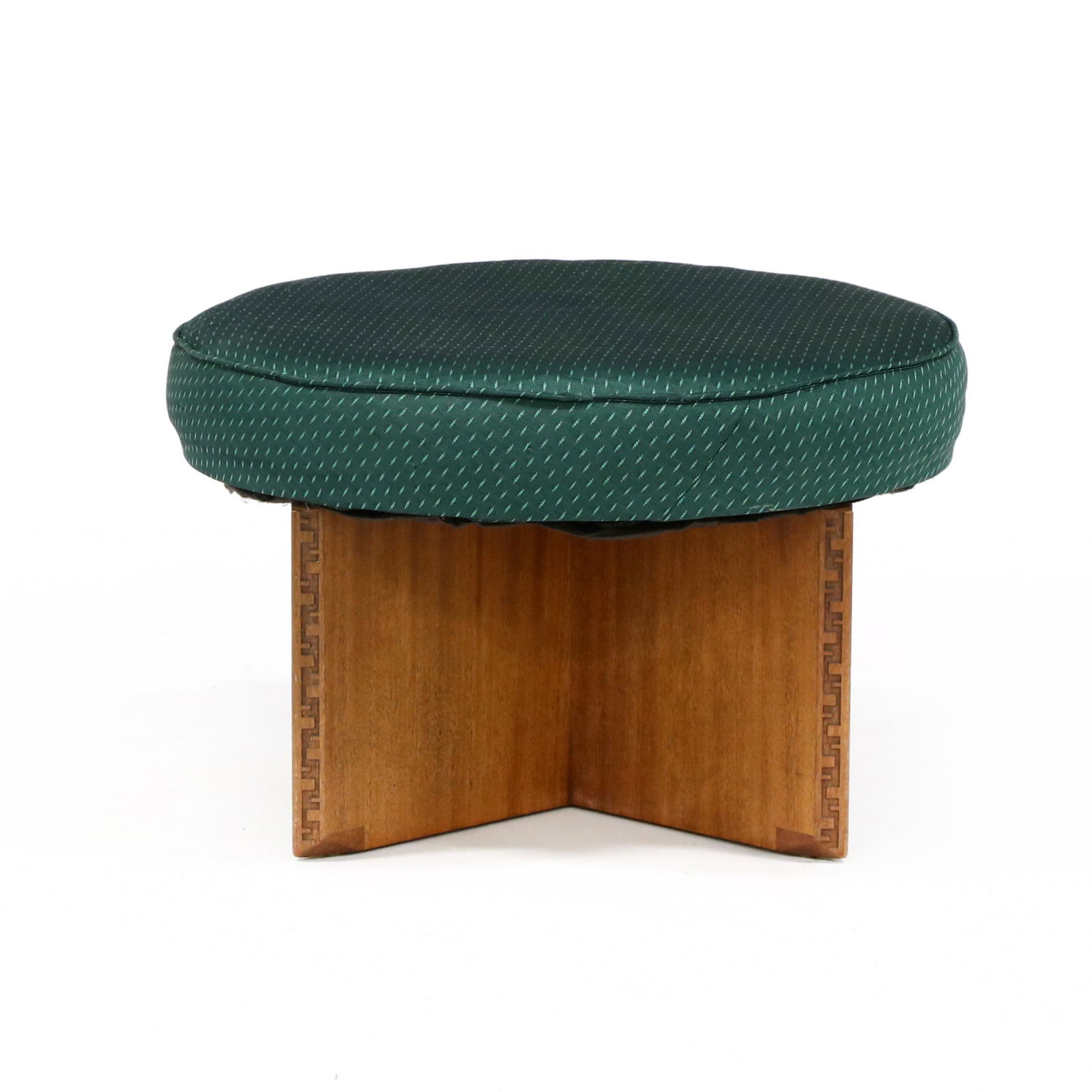 Frank Lloyd Wright (American, 1867-1959), Taliesin: Frank Lloyd Wright (American, 1867-1959), Taliesin StoolHenredon, 1950s, mahogany, mahogany veneer, dark green upholstered circular swivel seat on a cross form base with beveled and relief carved edge