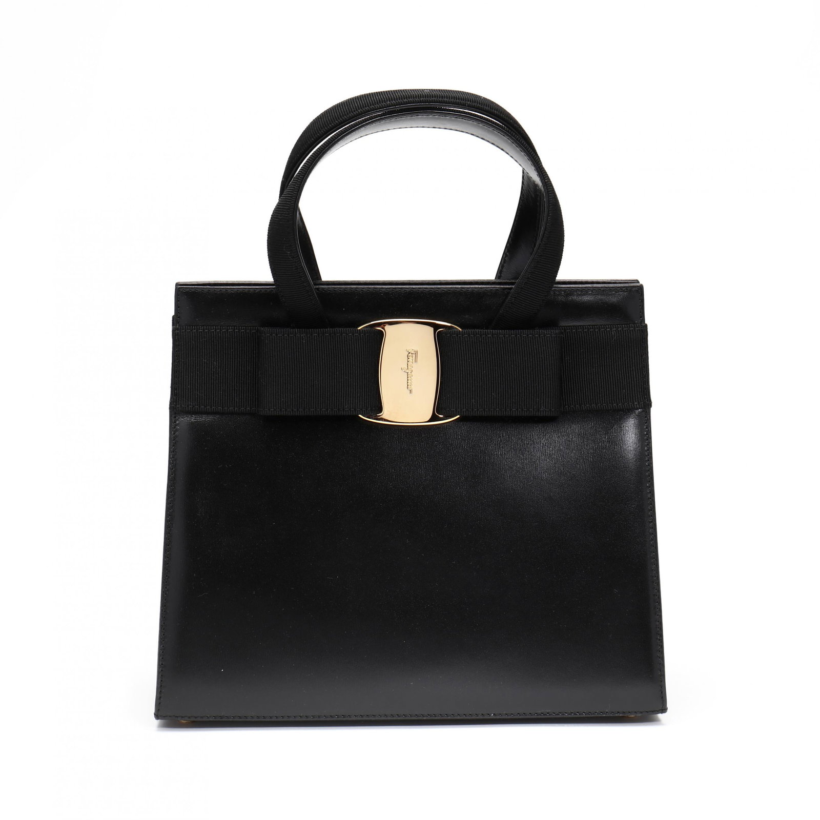 Vara Bow Top Handle Bag, Ferragamo: Vara Bow Top Handle Bag, Ferragamomade in Italy, composed of smooth black calfskin with decoration of applied grosgrain ribbon and Vara bow with a central Ferragamo signature buckle in gold tone metal