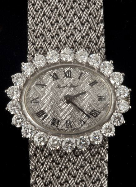 Lady's Diamond Wristwatch, Bueche Girod: Lady's Diamond Wristwatch, Bueche Girod centering on an oval shaped silver dial stamped "Bueche Girod" and framed by 22 full cut round diamonds prong set, fitted with a white gold tapered mesh bracele
