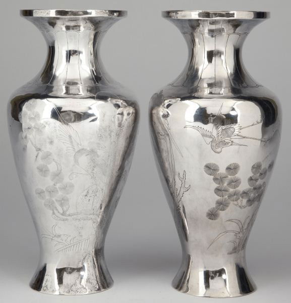 Pair of Chinese Export Silver Vases, circa 1900: Pair of Chinese Export Silver Vases, circa 1900 baluster form, the bodies engraved with cranes and hawks in a landscape, open cartouche on front, hallmarks to base. 8 in.