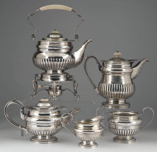 George IV Sterling Silver Tea & Coffee Service: George IV Sterling Silver Tea & Coffee Service an assembled five piece service including: kettle (London, partially rubbed hallmarks) on stand (partially rubbed hallmarks) with warmer (London, 1827, "