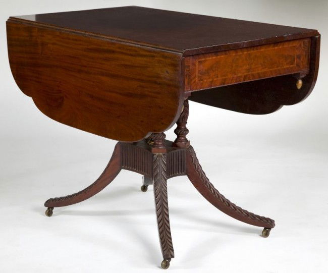 Federal Drop Leaf Library Table Duncan Phyfe: Federal Drop Leaf Library Table Duncan Phyfe or a contemporary of equal ability, New York, circa 1810-1830, mahogany and mahogany veneers, white pine secondary, having a single board top with shaped l