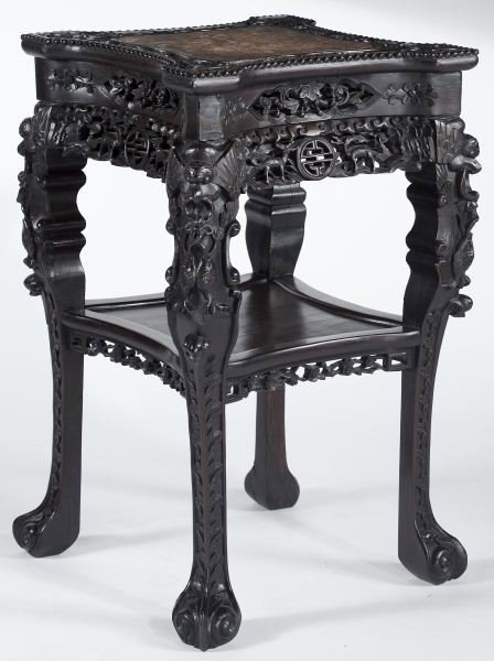 Antique Chinese Blackwood and Marble Side Table: Antique Chinese Blackwood and Marble Side Table late 19th century, inset with a mottled beige marble panel, heavily carved throughout, the apron with a vine motif above two deer flanking an openwork p