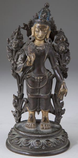 Fine Southeast Asian Standing Buddha: Fine Southeast Asian Standing Buddha likely 18th century, bronze and gilt bronze, the benevolent figure is standing on a circular lotus base, his right hand forming the Wheel of Dharma. Old mellow pat