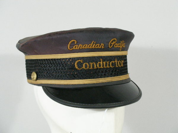 Vintage Canadian Pacific Railroad Hat,: Canadian Pacific Railroad Hat, black silk, black patent visor, gold embroidery onto hat "Canadian Pacific Conductor" w/gold cord trim, mfg "William Scully Montreal," size 7 1/2; silk cover faded; this