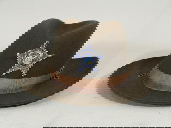 Police Hat, NC, Cowboy Style,: Police Hat, NC, Cowboy Style, c. 1980s, brown felt w/2 color silk ribbon, star badge w/blue inlay and multi-colored enamel state seal "Corporal Sheriff's Office Harnett County," manufactured by "Strat