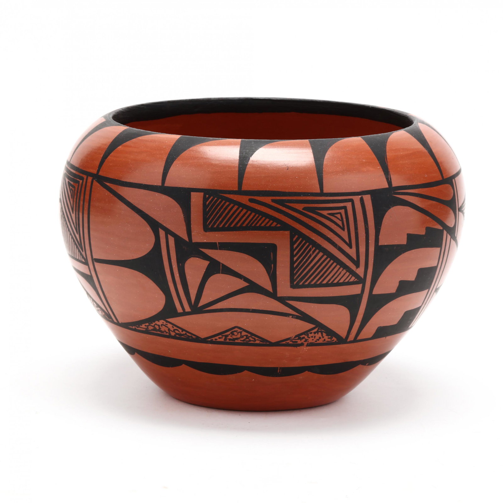 Native American Olla, Donald Chinana, Jemez Pueblo: Native American Olla, Donald Chinana, Jemez Pueblocoiled redware with black design, signed on the underside. 6 x 7 1/2 in. Donald Chinana was born in 1963 and has been making pottery since 1977. He sp