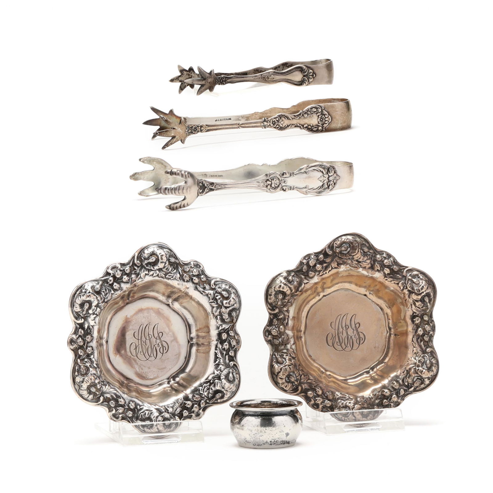 Six Sterling Silver Table Accessories: Six Sterling Silver Table Accessories including a pair of Watson Co. repoussÃ© dishes, retailer mark of Black Starr & Frost, pattern number B27, with matching script monograms to center (3 3/4 in.);