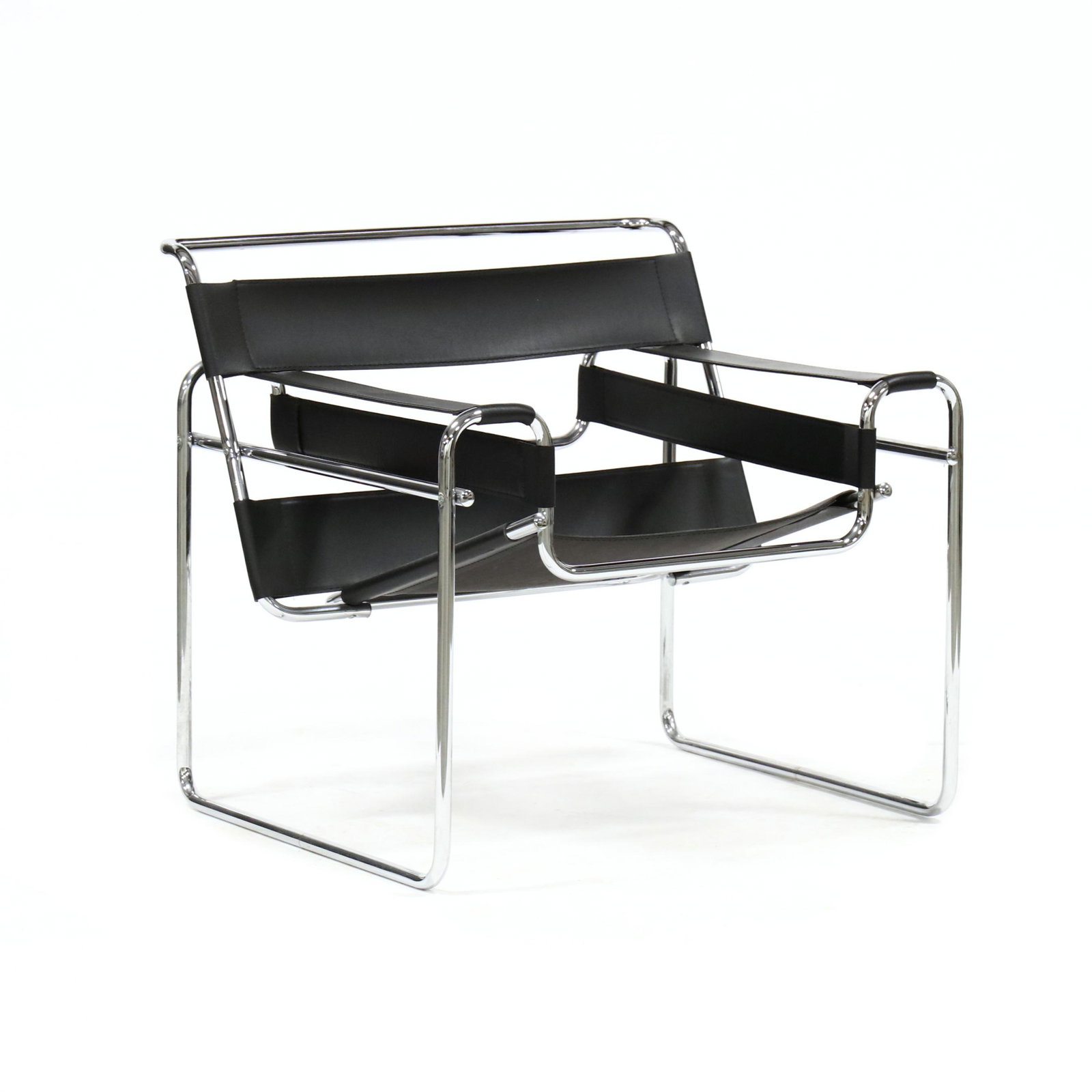 after Marcel Breuer, Wassily Chair: after Marcel Breuer, Wassily Chair late 20th century production, polished tubular steel frame with stitched black leather back/seat/arms, unmarked. 28.5 x 30.5 x 28.5 in. Private Collection, Durham, N