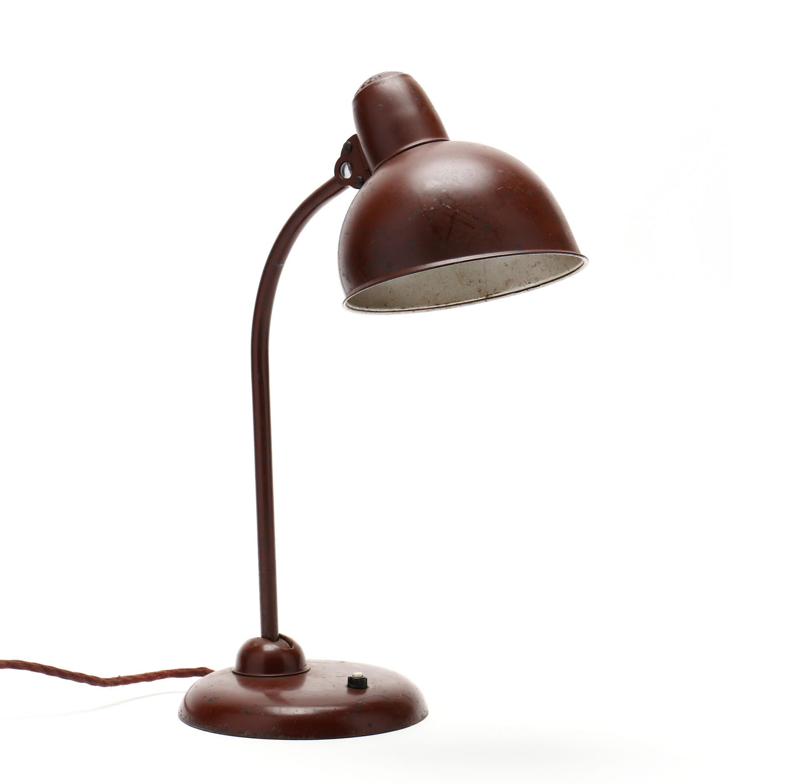 Christian Dell for KAISER idell, Vintage Desk Lamp: Christian Dell for KAISER idell, Vintage Desk LampGerman, circa 1950's, model 6556, single socket, dark crimson enameled form with adjustable reflector shade and arm, marked to shade posterior. 18 in.