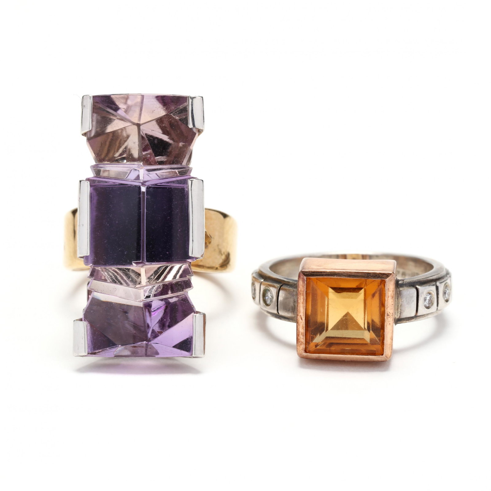 Two Mixed Metal and Gem-Set Rings: Two Mixed Metal and Gem-Set Ringsto include: a sculptural gold ring with bi-color amethyst (27.5 x 11.75 mm) set in platinum, stamped PT 18K and faintly inscribed ABD 92 (1.5 x .5 in,; ring size 5.5);
