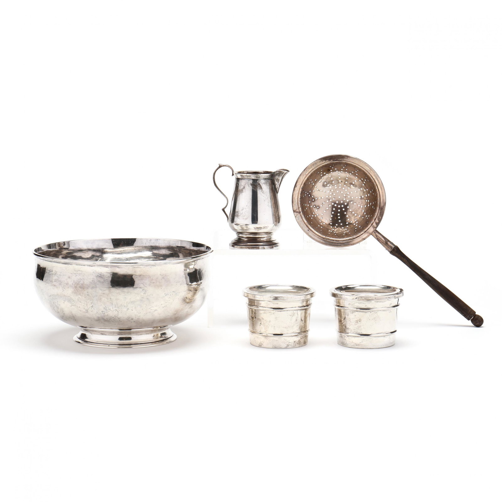 Five American Sterling Silver Table Accessories: Five American Sterling Silver Table Accessories to include: a Sterling silver footed round bowl, marked "Sterling / L" to underside (2 3/4 x 5 1/2 in.); pair of Gorham cylindrical low candlesticks, pa