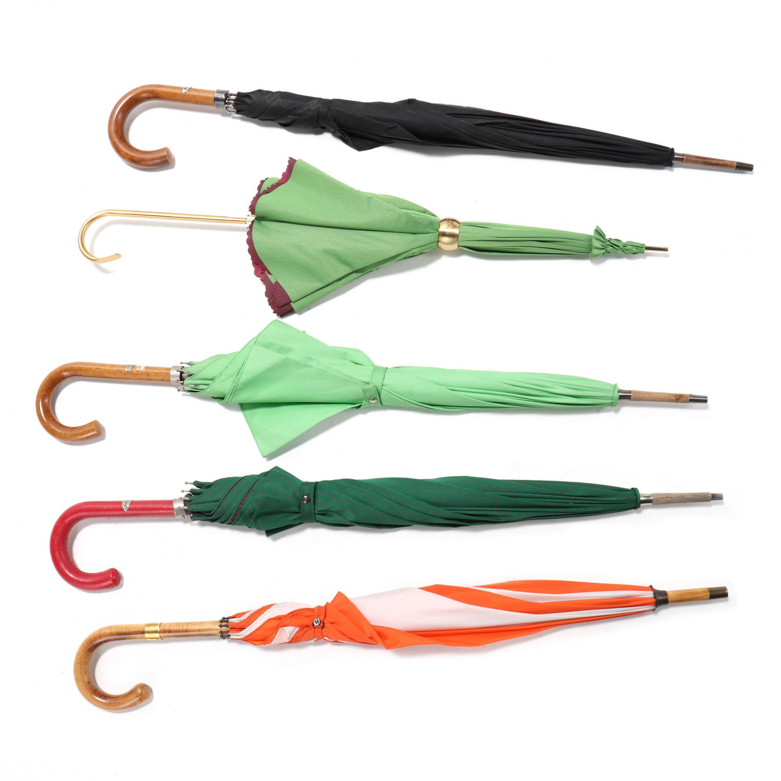 Five Fine Umbrellas: Five Fine Umbrellasincluding Alexandra Sojfer, (3) James Smith & Sons, and a orange/white nylon umbrella with Prince of Wales marking. Longest 39 in. From the Estate of the late Thomas and Pamela Wrig
