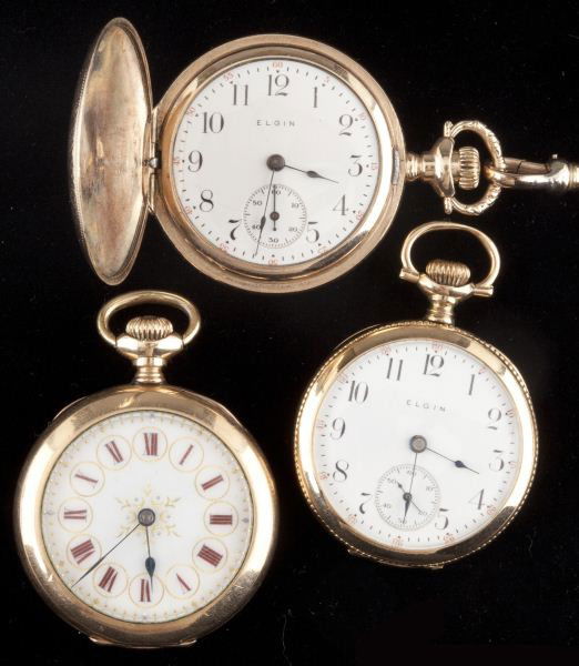 Group of Three Pocketwatches, Elgin and Omega: Group of Three Pocketwatches, Elgin and Omega the first is a gold filled Elgin with an unusual turned and checkered case with a watch chain; the second is a gold filled Omega with white enamel dial; a