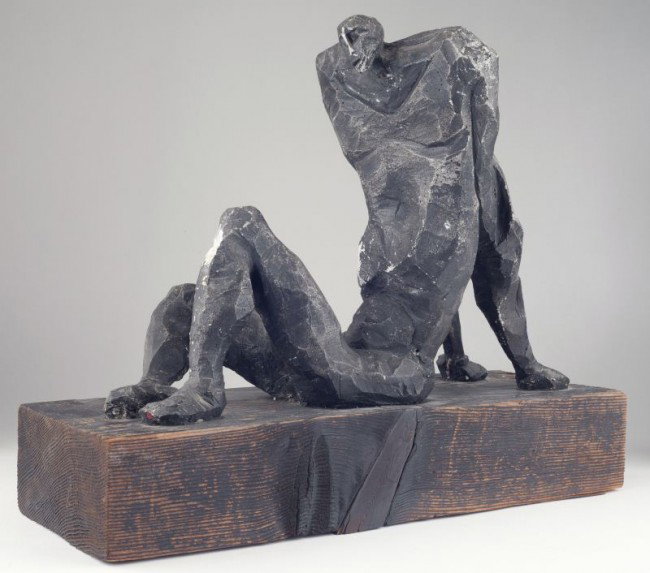 Mid Century Cubist Style Figural Sculpture: Mid Century Cubist Style Figural Sculpture the male figure of mythic proportions formed of plaster with graphite coloring and mounted to a rectangular wooden plinth with dark rubbed finish. DOA 15.5 x