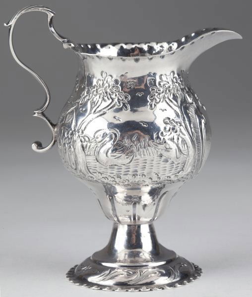 George III Silver Cream Jug: George III Silver Cream Jug London (1779), the inverted pear shaped body profusely decorated with a chased landscape populated by animals (including fox, dog, and swan), punched decoration to mouth an