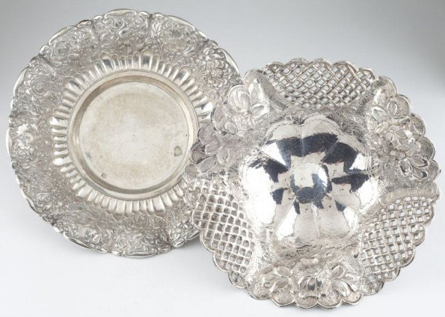 Two Middle Eastern Silver Bowls, 20th century: Two Middle Eastern Silver Bowls, 20th century the first of circular form with finely chased floral decoration to lobed rim, marked "TH / 800 / Nelux" on the underside, raised on three ball feet (18 tr