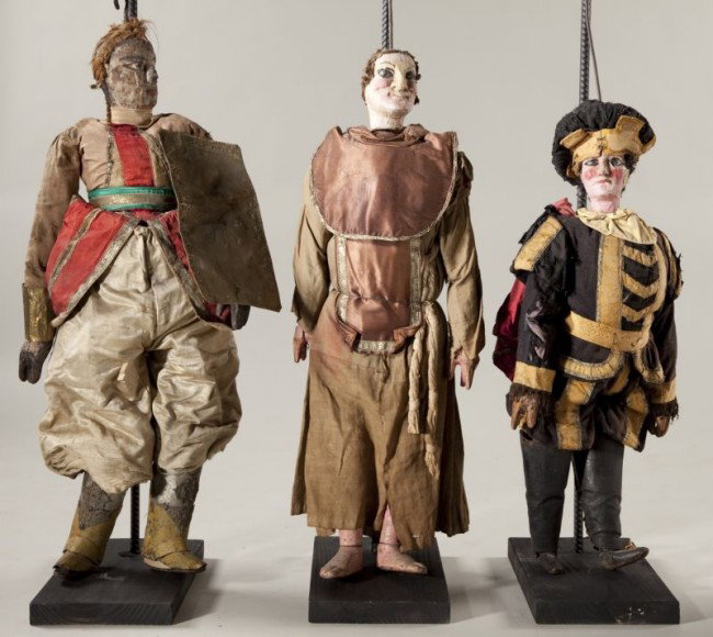 Three Antique Italian or Sicilian Rod Puppets: Three Antique Italian or Sicilian Rod Puppets late 19th century, carved polychrome heads, hands and feet, fabric costumes, depicting medieval characters as follows: Young male courtier (32.5 in.); Fri