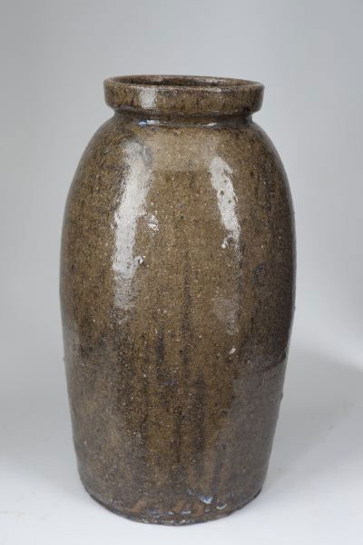 John Wesley Helton Storage Jar, NC Pottery: John Wesley Helton Storage Jar, NC Pottery 19th century, alkaline glazed stoneware, one gallon capacity, with interior rim and faint stamp to base side "J.W.H. / Blackburn / N.C." J.W. Helton (1846-19