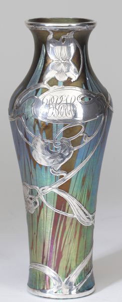 Loetz "Medici Phanomem" Silver Overlay Glass Vase: Loetz "Medici Phanomem" Silver Overlay Glass Vase unsigned, circa 1905, Austrian, vertical form vase with heavy silver overlay in an overall Art Nouveau applique with monogram. 9.5 x 3.25 in.