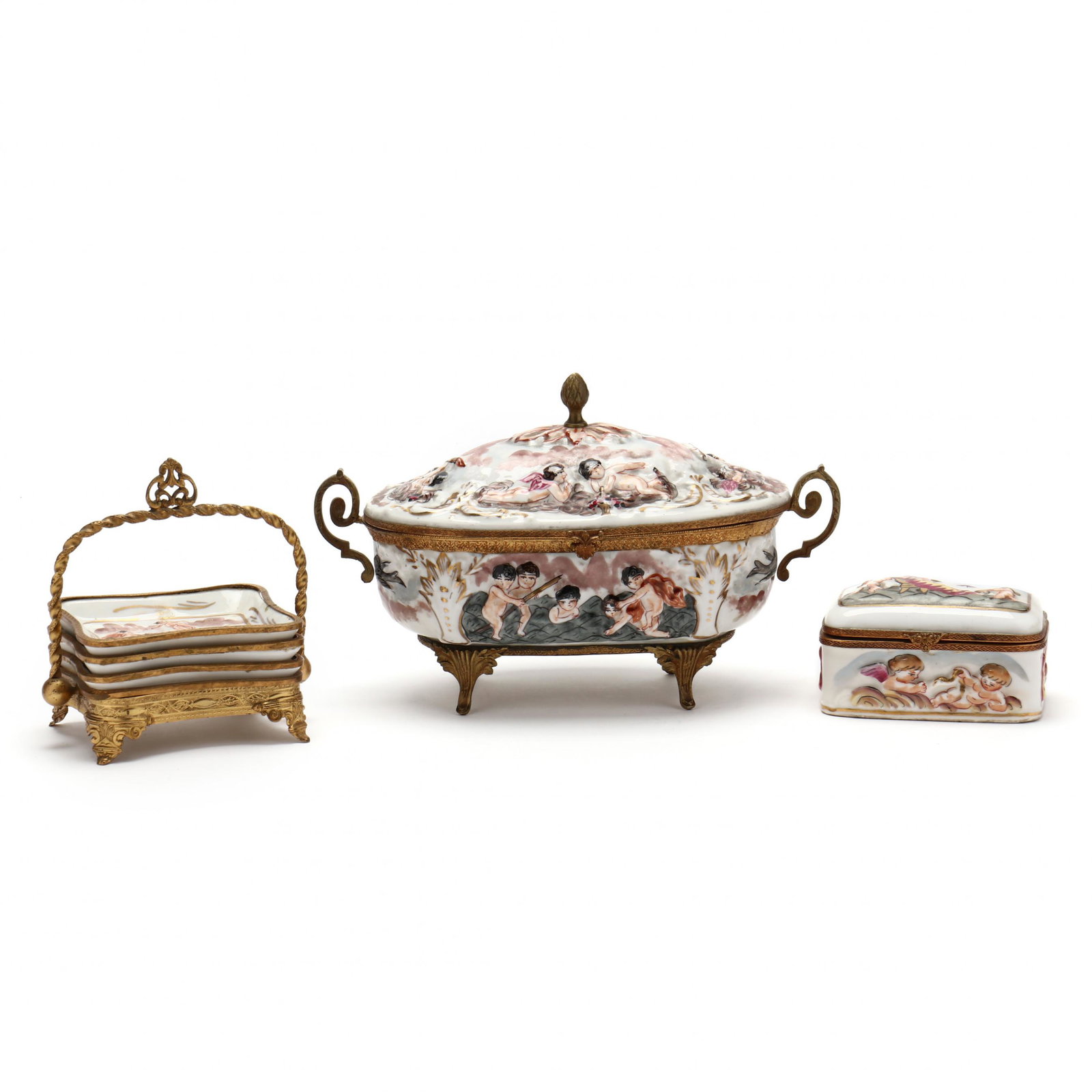 Three Vintage Capodimonte Style Porcelain Table Accessories: Three Vintage Capodimonte Style Porcelain Table AccessoriesFrance, polychrome glazed and gilt porcelain with ormolu mounts, each with raised Classical style figural decoration, including a lidded oval