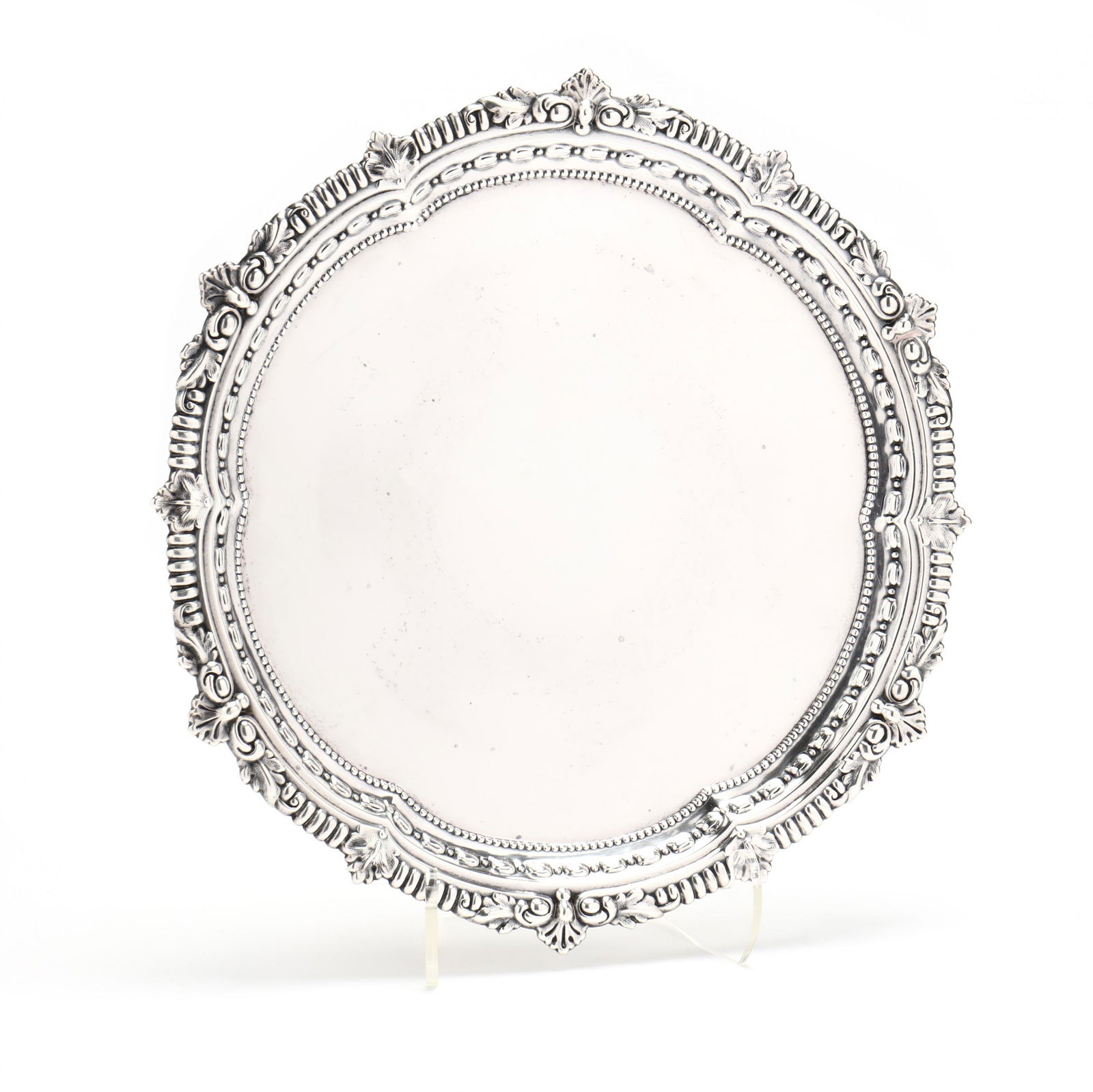 Sterling Silver Salver, Mark of Black, Starr & Frost: Sterling Silver Salver, Mark of Black, Starr & Frostlate 19th century, raised on three ball & claw feet, decorative rim with foliate detail, the inner rim with bellflower and beaded motif, no monogram
